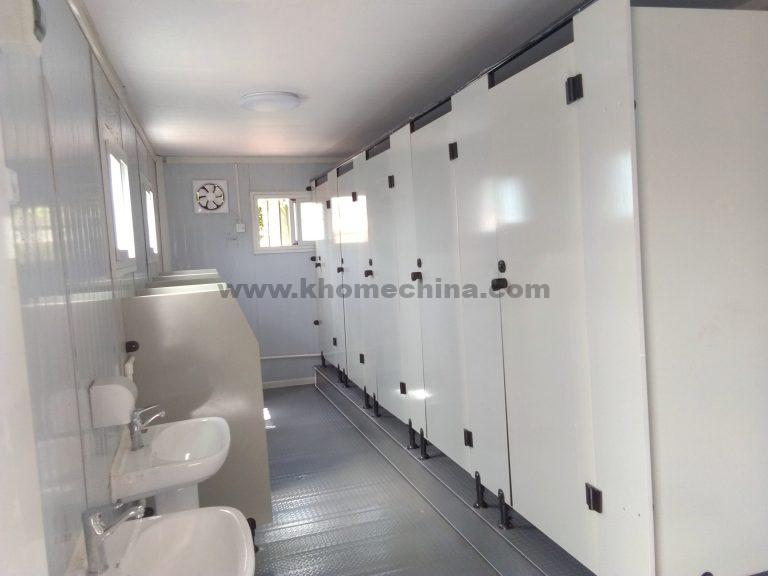 Container ablution block with interior step