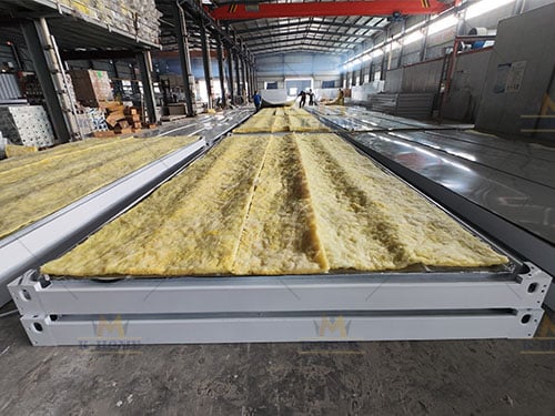 Flat-pack container roof insulation and covering process